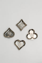 Suite de 4 vides poches cœur, carreau, trèfle et pique