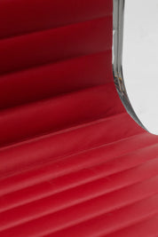 Chaise EA107 en cuir rouge par Charles & Ray Eames pour Vitra