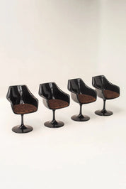 Chaises noires tulip en plastique moulé avec coussins léopard