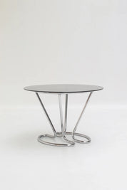 Table à manger chromée avec plateau en verre fumé
