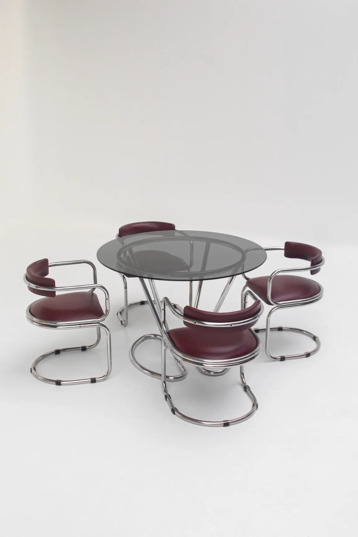 Table à manger chromée avec plateau en verre fumé