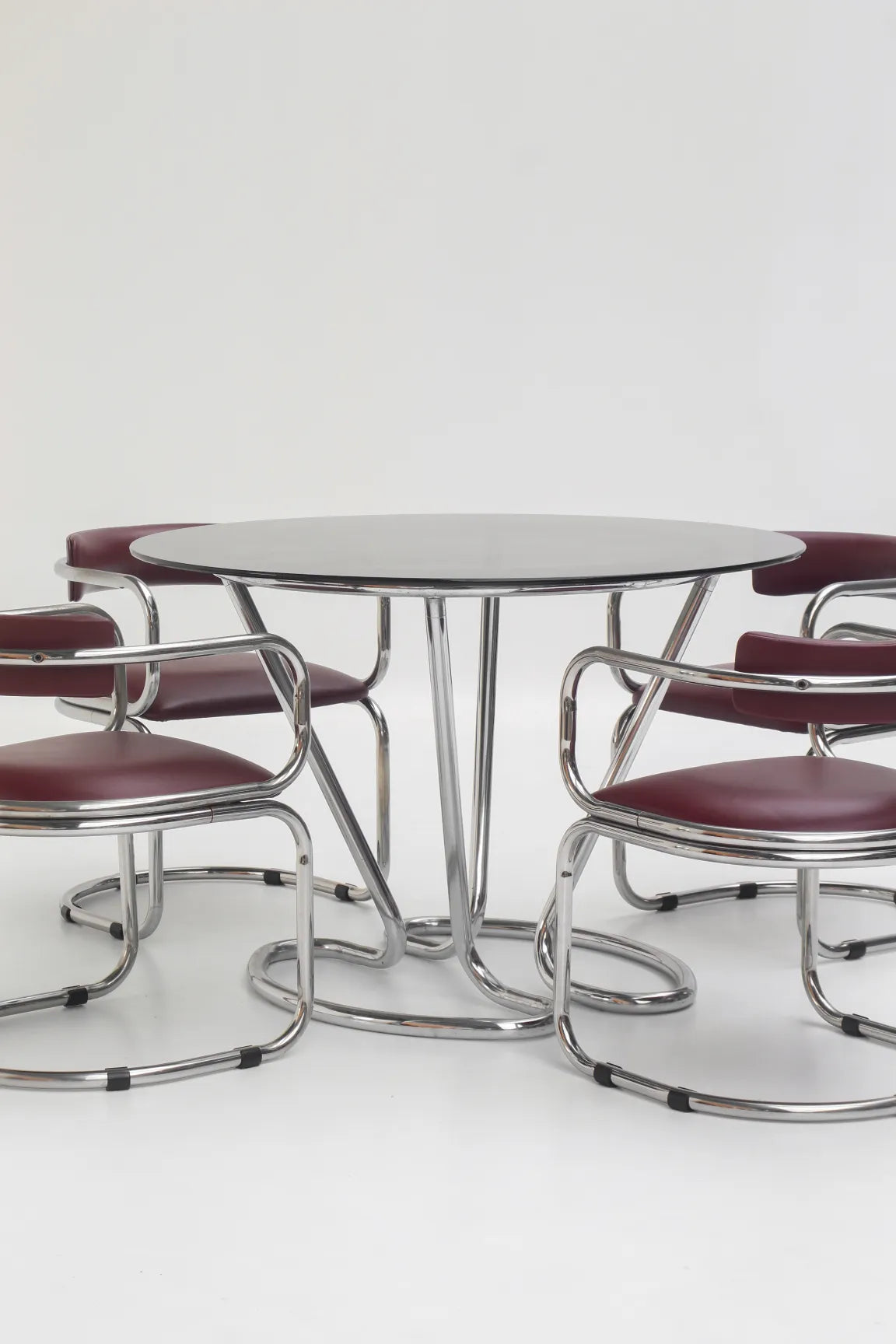 Table à manger chromée avec plateau en verre fumé